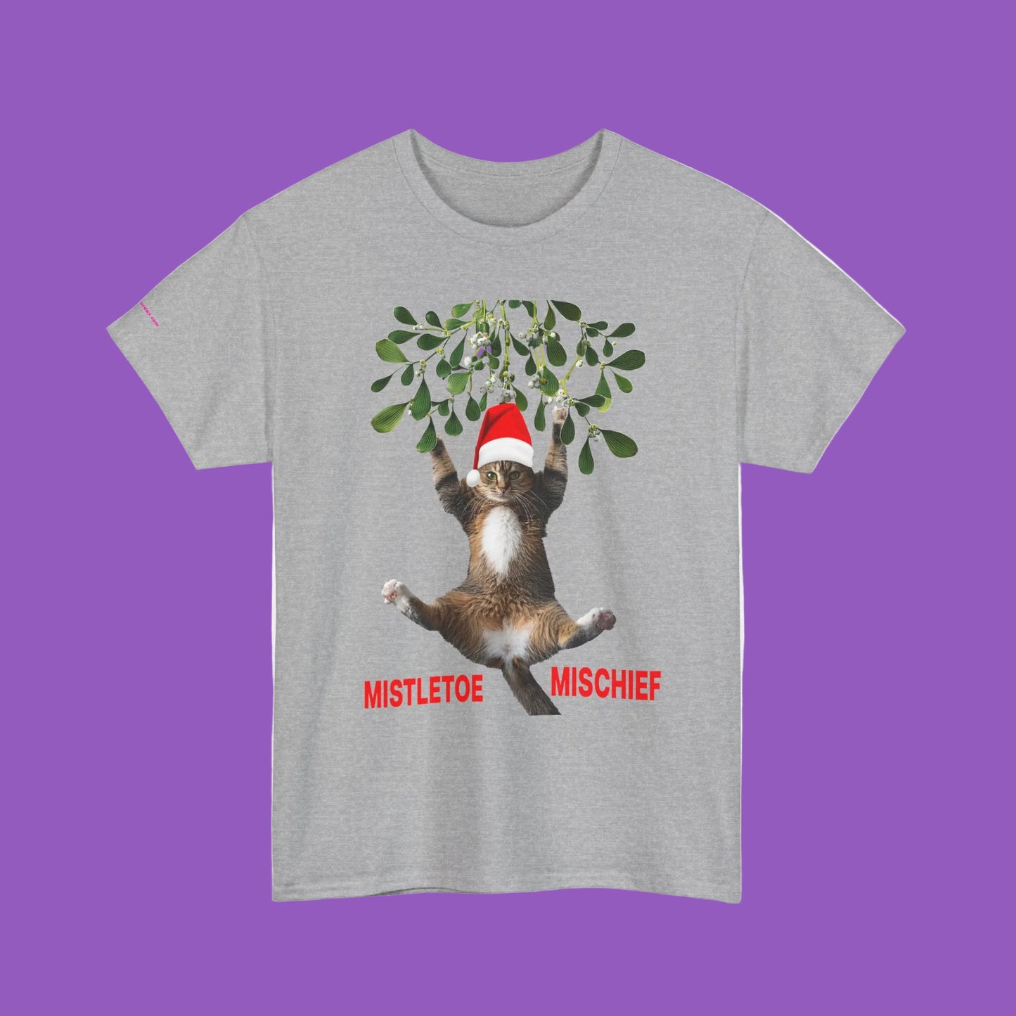 Mistletoe Mischief Cat T-Shirt — Cat in Santa Hat Hanging from Mistletoe Holiday Tee